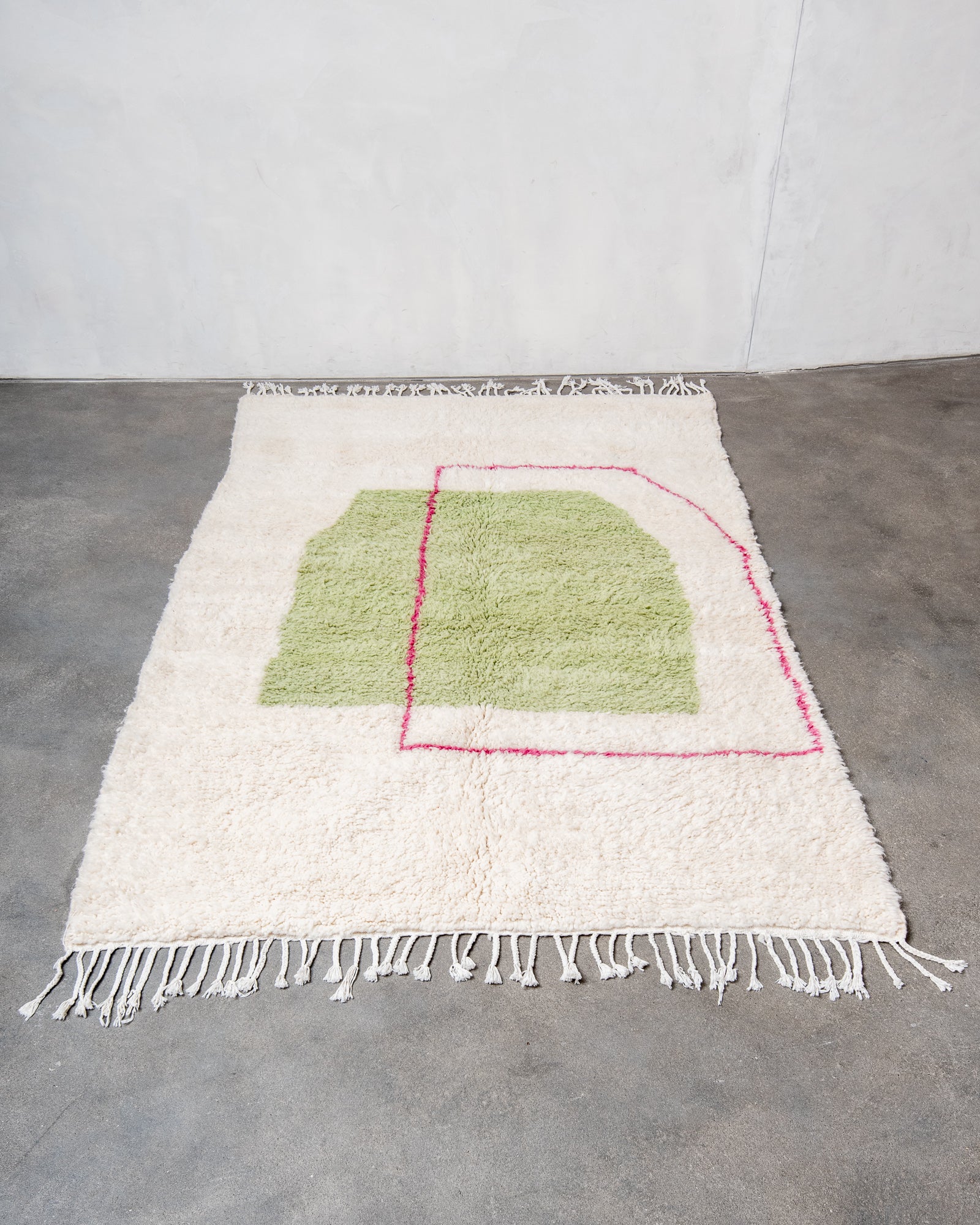 Modern, designer, handcrafted Berber rug from Morocco. Beniourain carpet with beautiful colours and patterns and fluffy wool texture.